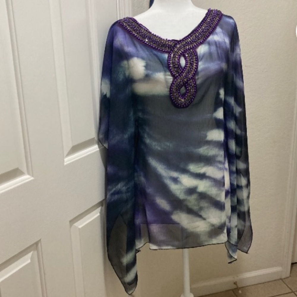 Awake Couture top. 
Embellish neck line with beads, rhinestones, and pearls.